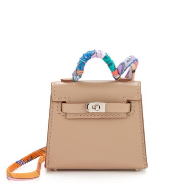 View full screen - View 1 of Lot 167. Argile Tadelakt Micro Twilly Kelly Bag Charm Palladium Hardware, 2021.