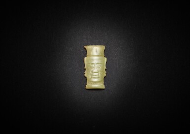 View full screen - View 1 of Lot 3794. A Shijiahe type pale celadon jade 'human face' plaque, Early Western Zhou dynasty | 西周早期 石家河類型淺青黃玉人面形飾.