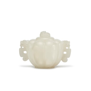 View full screen - View 1 of Lot 39. A white jade melon-shaped handled cup and cover, Qing dynasty .
