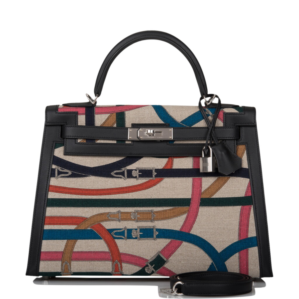 View full screen - View 1 of Lot 48. HERMÈS | CAVALCADOUR SELLIER KELLY 32CM OF BLACK SWIFT AND TOILE DE CAMP.