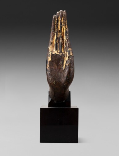View full screen - View 1 of Lot 13. A gilt-bronze fragmentary hand of a Buddha, Thailand, Ayutthaya period, 16th-17th century | 暹邏 阿瑜陀耶時期 十六至十七世紀 鎏金銅佛手殘件.