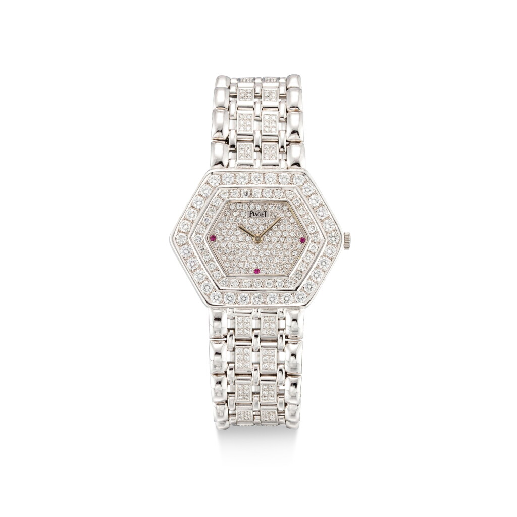View full screen - View 1 of Lot 8083. PIAGET | REFERENCE 9523 A 20 | A WHITE GOLD, DIAMOND AND RUBY-SET BRACELET WATCH, CIRCA 1990 | 伯爵 | 型號9523 A 20 白金鑲鑽石及紅寶石鏈帶腕錶,約1990年製.