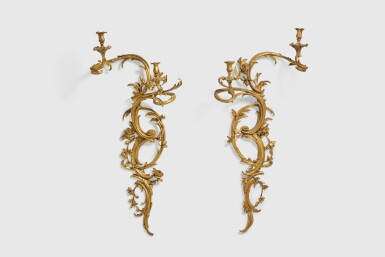 View full screen - View 1 of Lot 377. A Pair of Louis XV Carved and Oil-Gilt Wood Two-Light Wall Appliques, possibly German, Mid-18th Century.