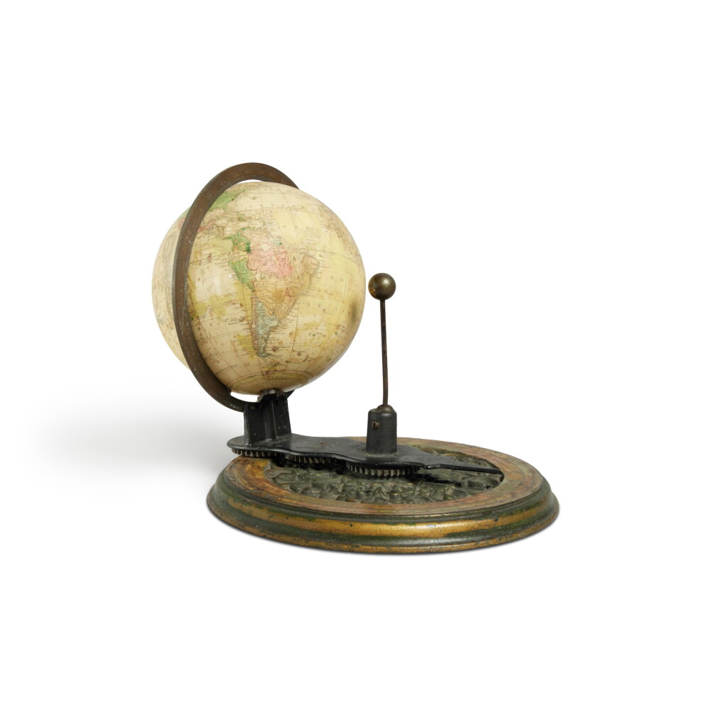 View full screen - View 1 of Lot 120. An American Brass, Ebonised Wood and Parcel Green and Gold-Painted Telluric Indicator with a Joslin's Six-Inch Terrestrial Globe, 19th Century.