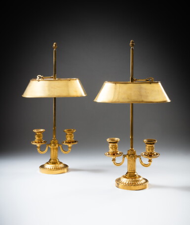 View full screen - View 1 of Lot 314. A pair of late Louis XVI gilt-bronze lampes bouillotte, circa 1780 | Paire de lampes bouillotte en bronze doré de la fin de l'époque Louis XVI, vers 1780.