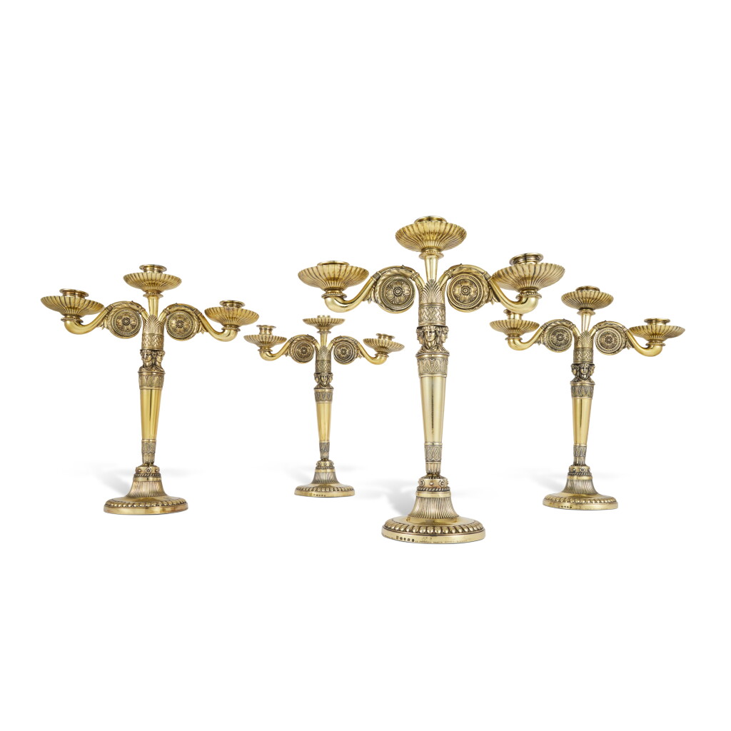 View full screen - View 1 of Lot 57. A Set of Four George III Ambassadorial Silver-Gilt Three-Light Candelabra, Digby Scott & Benjamin Smith for Rundell, Bridge & Rundell, London, 1804.