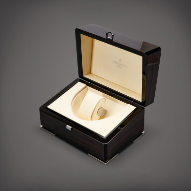 View full screen - View 1 of Lot 870. A wooden watch winding box, Circa 2018 | 百達翡麗 | 木製自動上弦錶盒,約2018年製.