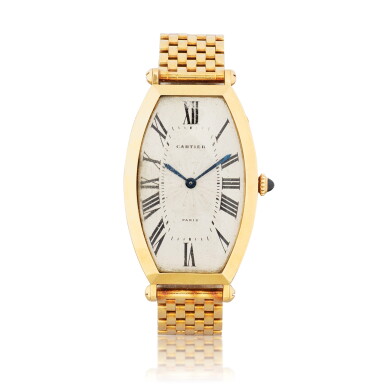 View full screen - View 1 of Lot 1042. Tonneau Montre bracelet en or jaune | Yellow gold wristwatch Vers 1986 | Circa 1986.
