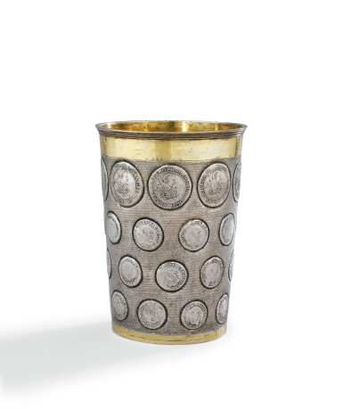 View full screen - View 1 of Lot 209. A LARGE GERMAN, SILVER AND SILVER-GILT BEAKER, CIRCA 1690 | GRAND GOBELET À PIÈCES EN ARGENT ET VERMEIL, ALLEMAGNE, VERS 1690.