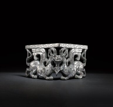 View full screen - View 1 of Lot 20. An important and extremely rare silver-inlaid bronze corner-piece, Eastern Zhou dynasty, Warring States period | 東周戰國時期 銅錯銀獸形承足.