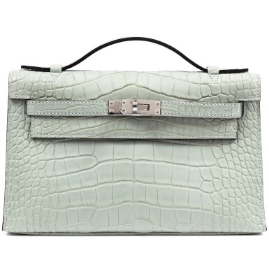 View full screen - View 1 of Lot 609. Gris Neve Matte Mississippiensis Alligator Kelly Pochette Palladium Hardware, 2026.