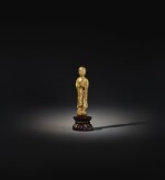 A gilt-bronze figure of a Buddhist disciple Tang dynasty | 唐 鎏金銅尊者立像