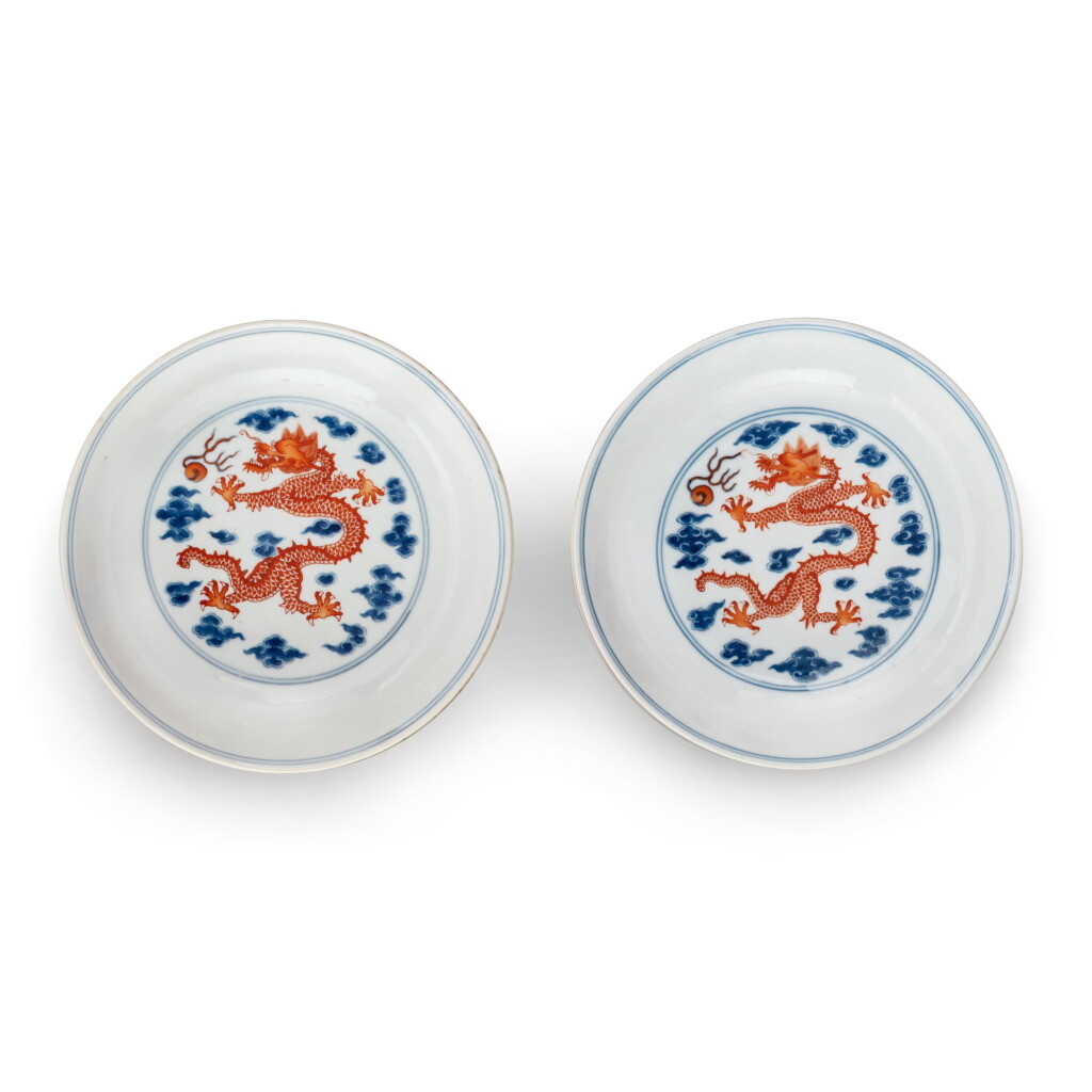 View full screen - View 1 of Lot 135. A pair of blue and white and iron-red 'dragon' dishes, Seal marks and period of Yongzheng | 清雍正 青花礬紅彩雲龍紋盤一對 《大清雍正年製》款.