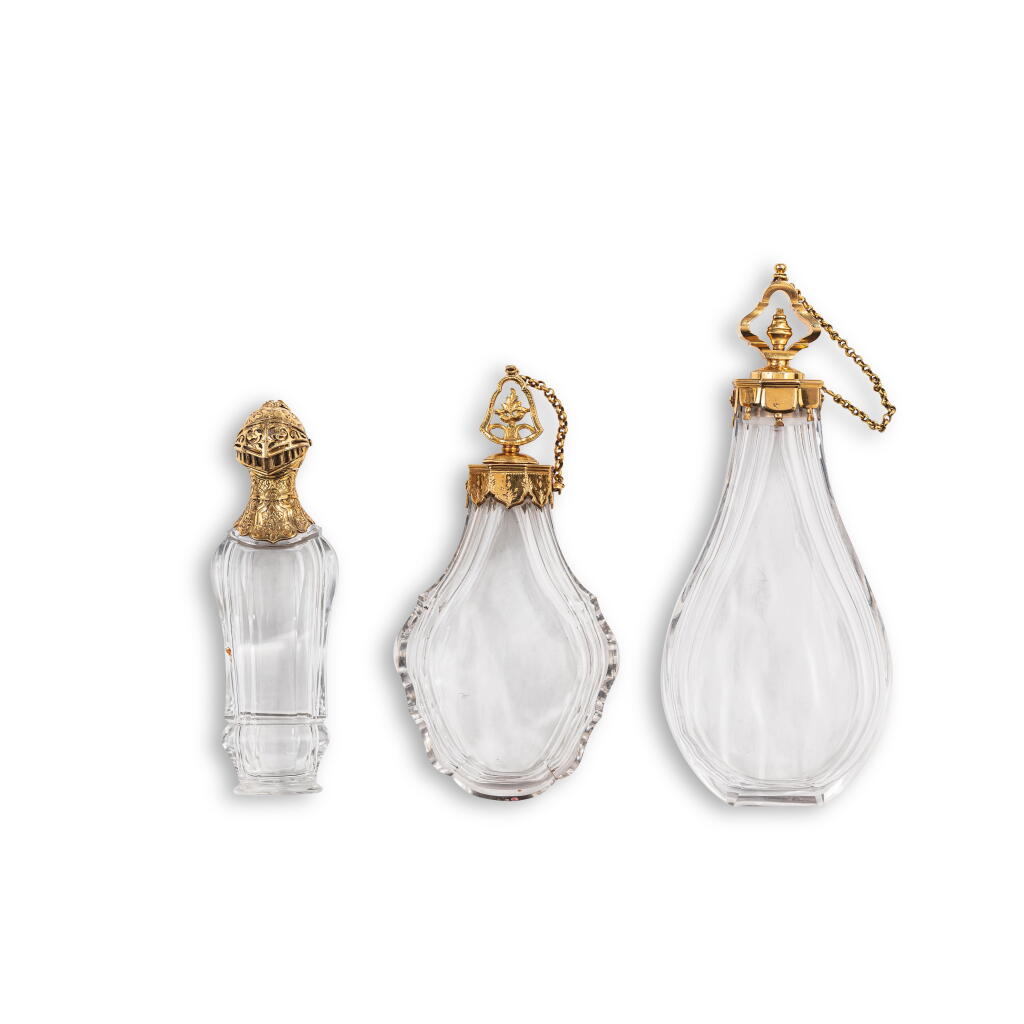 View full screen - View 1 of Lot 605. A group of three gold-mounted glass scent bottles, Paris, mid-18th and early 19th century.