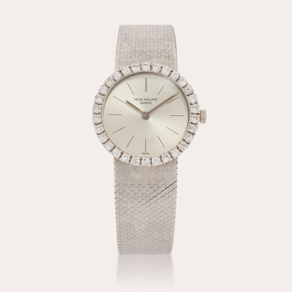 View full screen - View 1 of Lot 384. Reference 3345 | A white gold and diamond-set bracelet watch, Circa 1966.