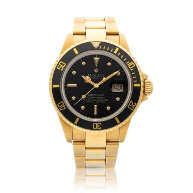 View full screen - View 1 of Lot 8122. Submariner, Reference 16808 | A yellow gold wristwatch with date and bracelet, Circa 1983 | 勞力士 | Submariner 型號16808 | 黃金鏈帶腕錶,備日期顯示,約1983年製.