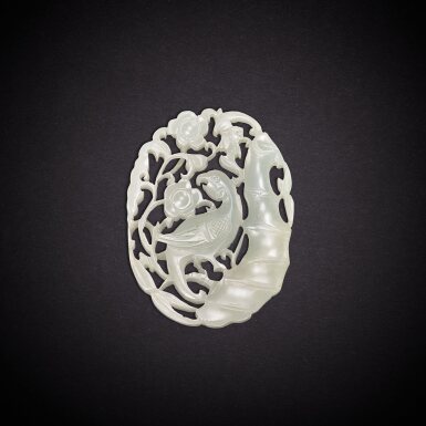 View full screen - View 1 of Lot 6908. A white jade reticulated 'magpie and prunus' plaque, Qing dynasty, 18th century | 清十八世紀 白玉鏤雕喜上眉梢珮.