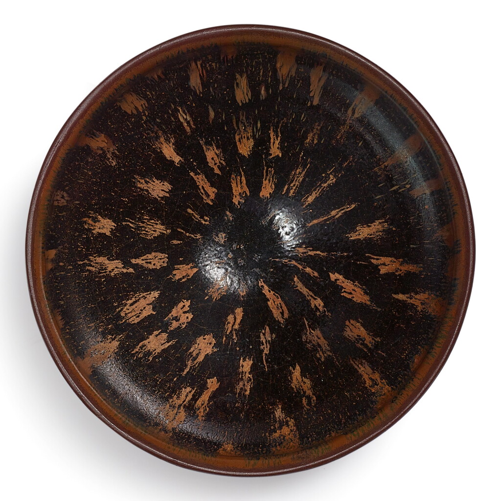 View full screen - View 1 of Lot 69. A RARE RUSSET-PAINTED BLACK-GLAZED 'PARTRIDGE FEATHER' BOWL SOUTHERN SONG DYNASTY | 南宋 黑釉鐵鏽斑天目茶盞.