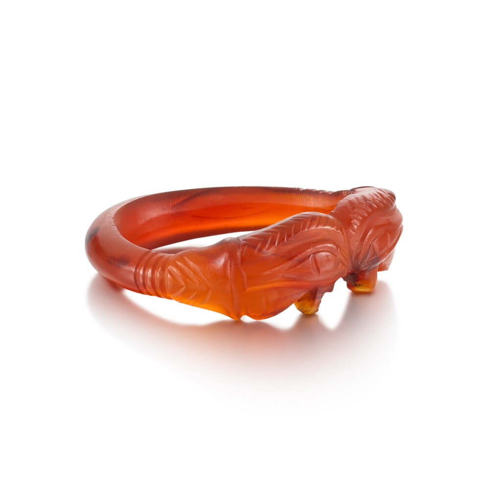 View full screen - View 1 of Lot 57. An Egyptian Carnelian Ring, New Kingdom, 1540-1075 B.C.