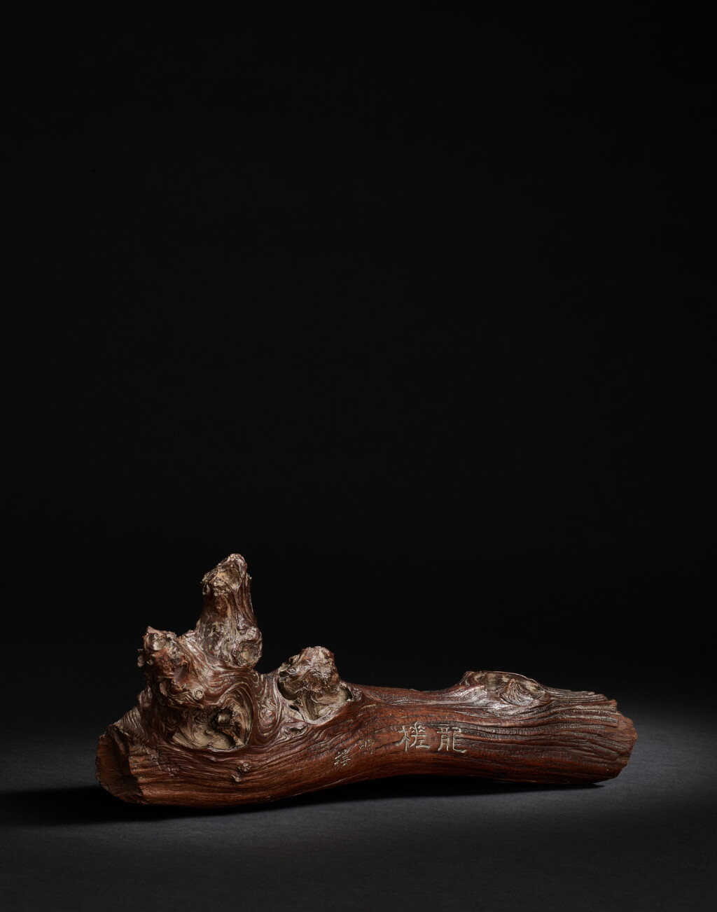 View full screen - View 1 of Lot 8059. An extremely rare inscribed 'shanmu' 'dragon' raft, inscription by Du Meigen, Qing dynasty, Guangxu period | 清光緒 杉木刻詩龍槎 《梅根》款.