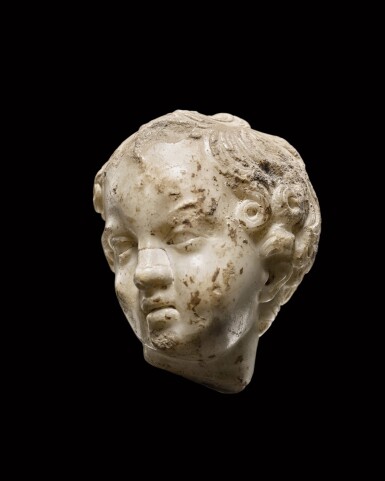 View full screen - View 1 of Lot 151. A Roman Marble Head of Eros, circa 1st/2nd Century A.D..