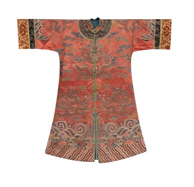 View full screen - View 1 of Lot 184. A salmon-ground embroidered 'dragon' robe Qing dynasty, early 18th century | 清十八世紀早期 杏緞織龍紋褂.