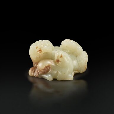 View full screen - View 1 of Lot 3664. A white and russet jade 'Buddhist lion' group, Qing dynasty | 清 白玉太獅少獅.