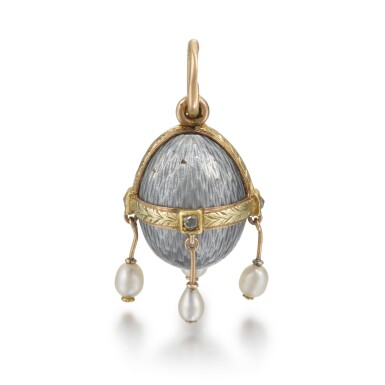 View full screen - View 1 of Lot 415. A Fabergé jewelled varicoloured gold and guilloché enamel egg pendant, workmaster Henrik Wigström, St Petersburg, circa 1900.
