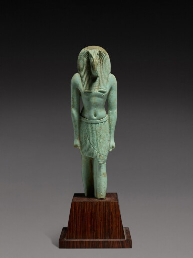 View full screen - View 1 of Lot 209. An Egyptian Faience Figure of Thoth, 26th/30th Dynasty, 664-380 B.C..