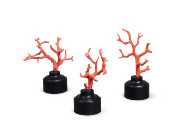 View full screen - View 1 of Lot 21. A set of three red coral branches on turned wood stands Trois branches de corail rouge sur des bases en bois tourné.