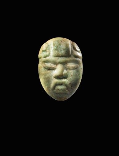 View full screen - View 1 of Lot 6. Masquette en jade, Culture Olmèque, Préclassique Moyen, 900-600 AV. J.-C. | Olmec jade maskette, Middle Preclassic, 900-600 AV. J.-C..