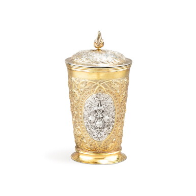 View full screen - View 1 of Lot 213. A parcel-gilt silver beaker and cover, bearing pseudo Russian marks, 20th century.