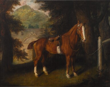 View full screen - View 1 of Lot 381. A saddled chestnut hunter tethered to a post with the entrance to stables and a wooded landscape beyond.