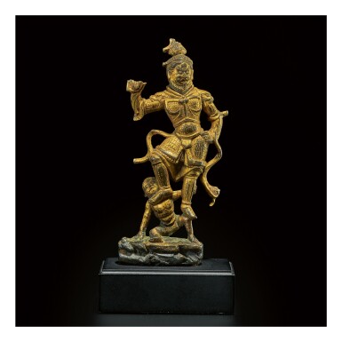 View full screen - View 1 of Lot 599. A SMALL GILT-BRONZE FIGURE OF A GUARDIAN, TANG DYNASTY.