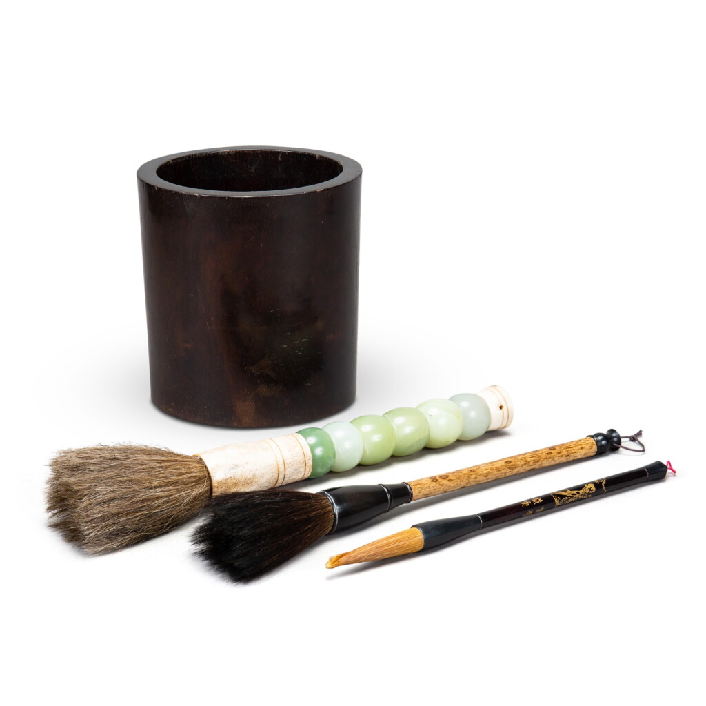 View full screen - View 1 of Lot 203. A zitan brushpot, Qing dynasty, 17th-18th century | 清十七至十八世紀 紫檀筆筒 及 毛筆 一組三件.