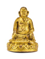 A SMALL GILT-BRONZE FIGURE OF MARPA, TIBET, 17TH CENTURY | 十七世紀 藏傳鎏金銅瑪爾巴譯師小坐像