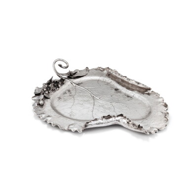 View full screen - View 1 of Lot 20. A silver tray in the shape of a water lily leaf, Austria, 1866-1922 | Plateau en argent en forme de feuille de nénuphar, Autriche, 1866-1922.