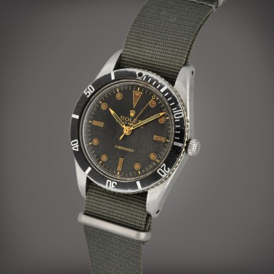 View full screen - View 1 of Lot 30. Submariner, Reference 6204 | A stainless steel wristwatch | Circa 1954.