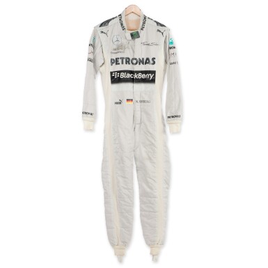 View full screen - View 1 of Lot 53. Nico Rosberg 2013 Signed and Worn Racing Suit.