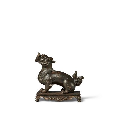 View full screen - View 1 of Lot 124. A bronze figure of a qilin, Qing dynasty.