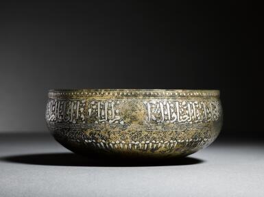 View full screen - View 1 of Lot 127. A gold and silver-inlaid brass bowl, Mosul, Jazira, 13th century.