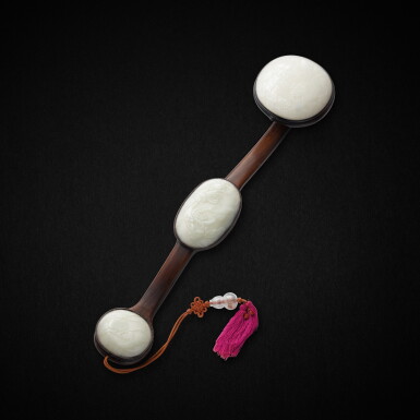 View full screen - View 1 of Lot 8909. A white jade-inlaid wood 'elephant' ruyi sceptre, Qing dynasty, 19th century | 清十九世紀 木嵌白玉太平有象萬壽如意.