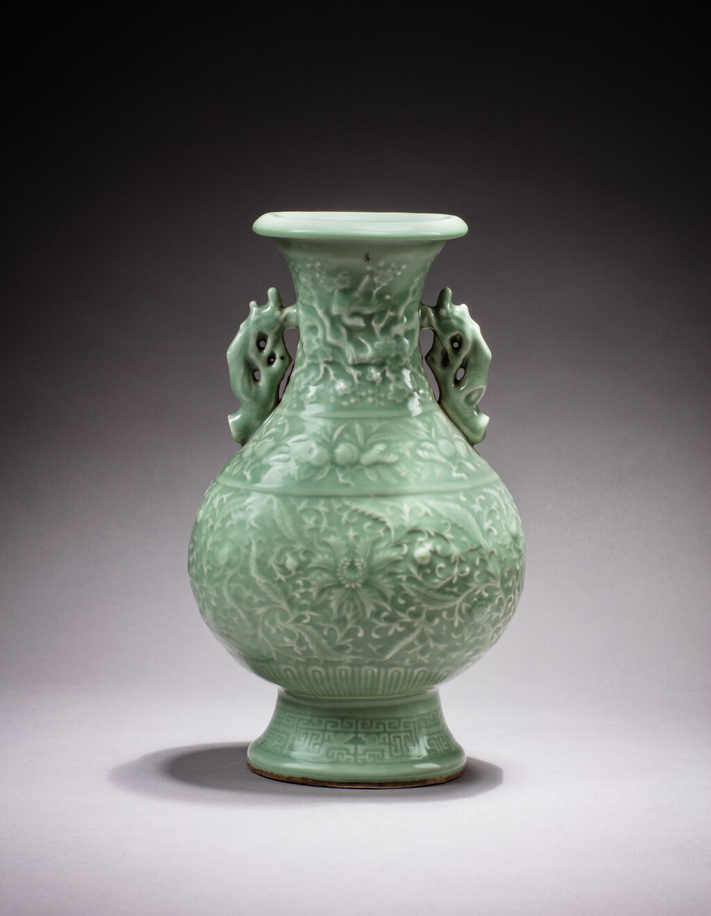 View full screen - View 1 of Lot 240. A celadon-glazed 'lotus and peach' vase, 20th century | 二十世紀 青釉纏枝花卉紋雙耳瓶.