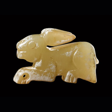 View full screen - View 1 of Lot 43. A jade 'rabbit' pendant Shang – early Western Zhou dynasty | 商至西周早期 玉兔珮飾.
