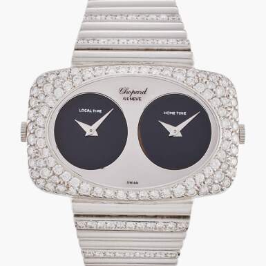 View full screen - View 1 of Lot 661. Reference 2051-1 | A white gold and diamond-set dual time zone bracelet watch with onyx dials, Circa 1970.