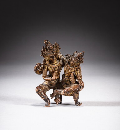 View full screen - View 1 of Lot 101. A gilt-bronze seated figure of Uma-Maheshvara, Nepal, Mala period, 15th century | 尼泊爾 馬拉王朝時期十五世紀 銅鎏金烏瑪–大自在天坐像.