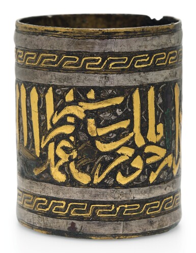 View full screen - View 1 of Lot 217. A MAMLUK GOLD AND SILVER-INLAID BRASS INKWELL, EGYPT OR SYRIA, FIRST HALF 14TH CENTURY.