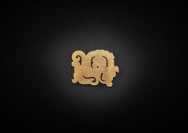 View full screen - View 1 of Lot 3805. A celadon jade openwork 'human-dragon' plaque, Mid - late Western Zhou dynasty | 西周中晚期 淺青灰玉透雕雙龍人首紋項飾.