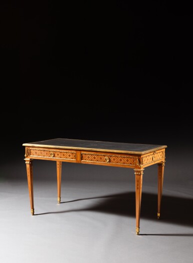View full screen - View 1 of Lot 197. A Louis XVI gilt-bronze mounted lemon tree, amaranth and holly marquetry bureau plat, circa 1775, attributed to Mathieu-Guillaume Cramer.