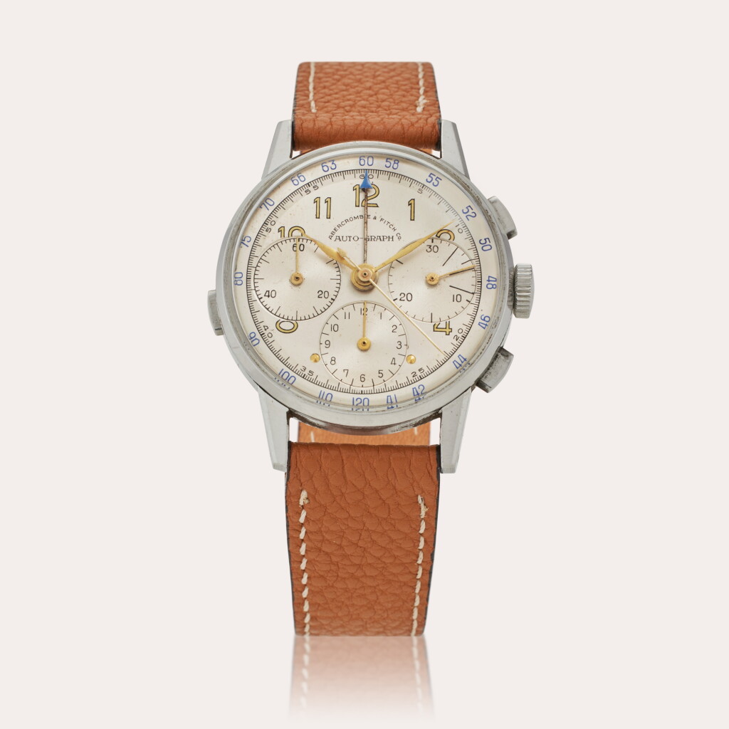 Voir en plein écran - Voir 1 du lot 100. Auto-Graph | Retailed by Abercrombie & Fitch Co.: A stainless steel chronograph wristwatch, Circa 1953.